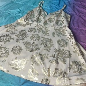 miniskirt-dress with spaghetti straps.